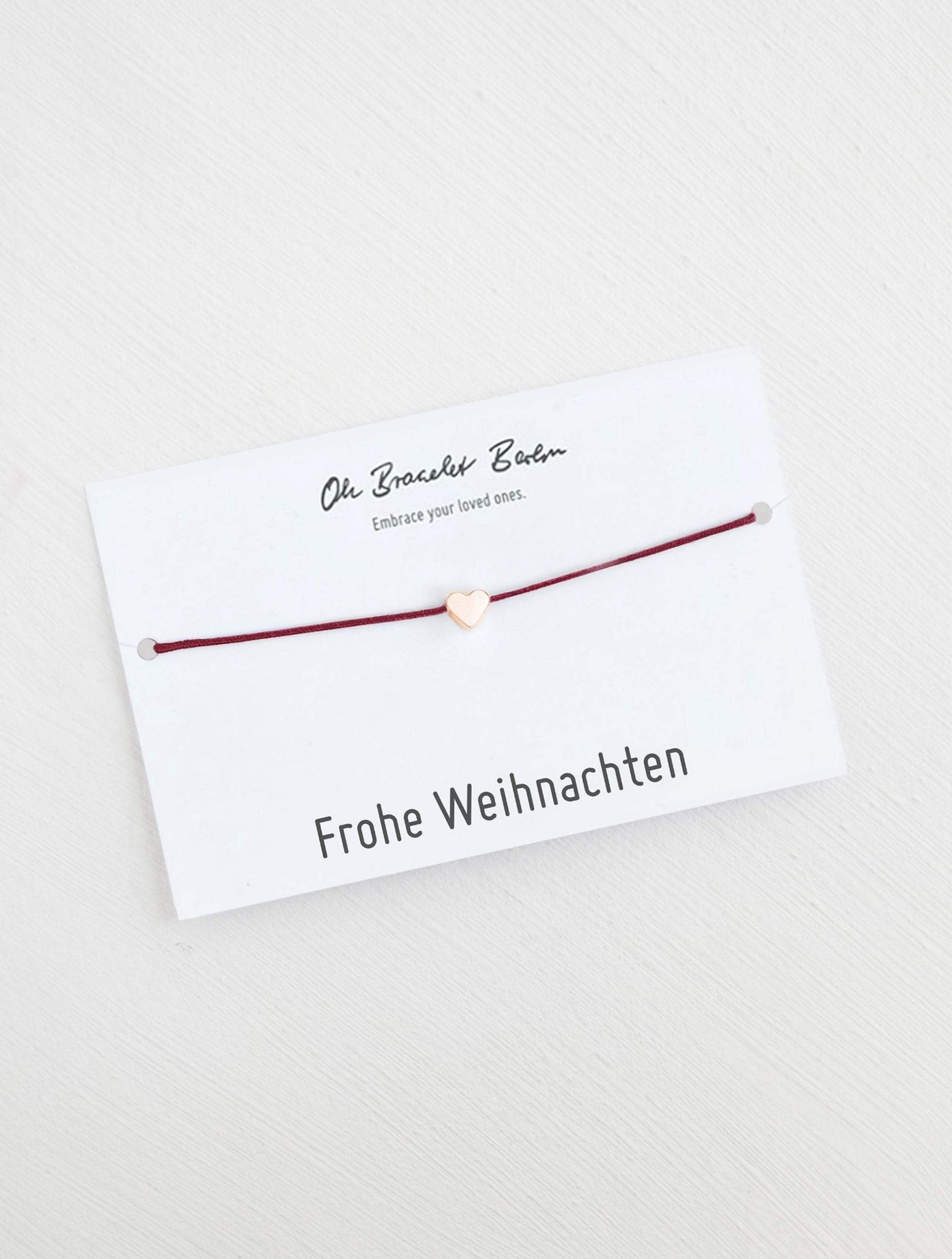 Herz Armband an Karte mit Spruch Frohe Weihnachten in der Farbe Roségold und Bordeaux