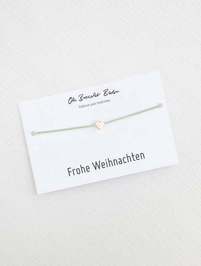 Herz Armband an Karte mit Spruch Frohe Weihnachten in der Farbe Roségold und Mint