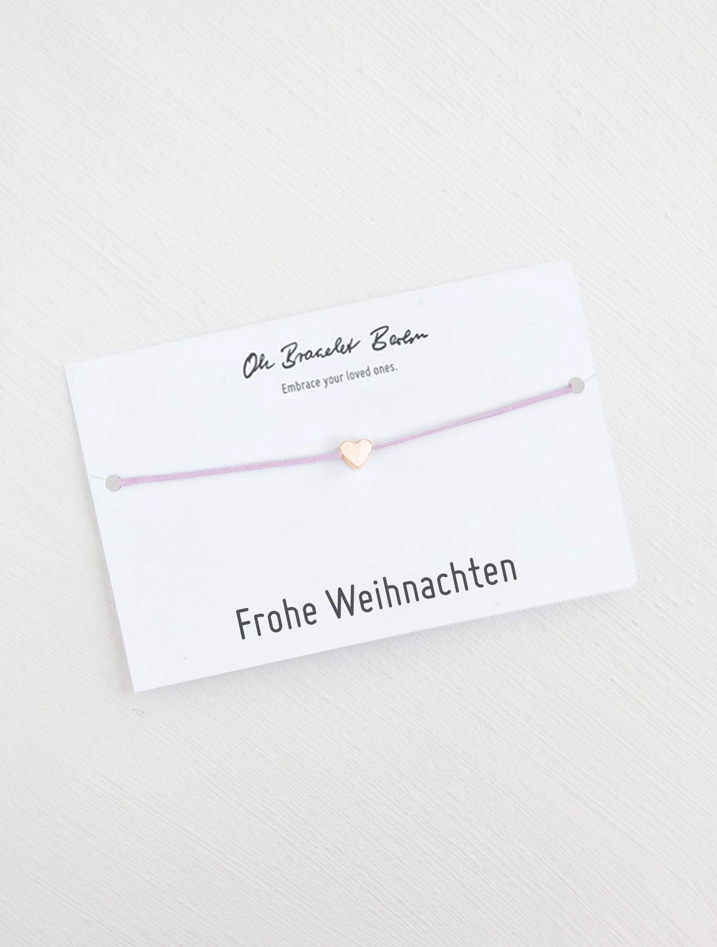 Herz Armband an Karte mit Spruch Frohe Weihnachten in der Farbe Roségold und Rosa